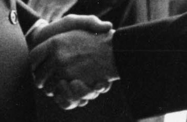 Detail of photograph of handshake between Leverett Saltonstall and Lyndon Johnson at the White House